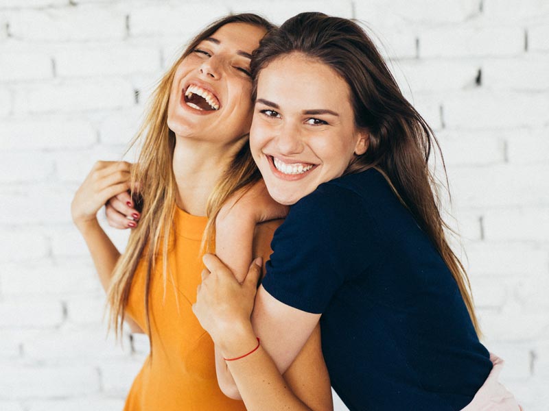 two friends laughing